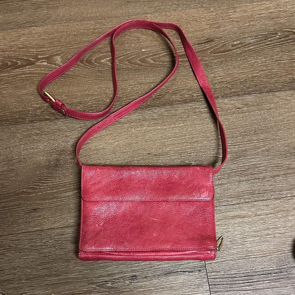 Elegant magenta Leather Crossbody Bag with great organization